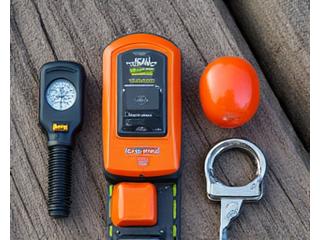 Emergency kite retrieval system components laid out on a boat deck.